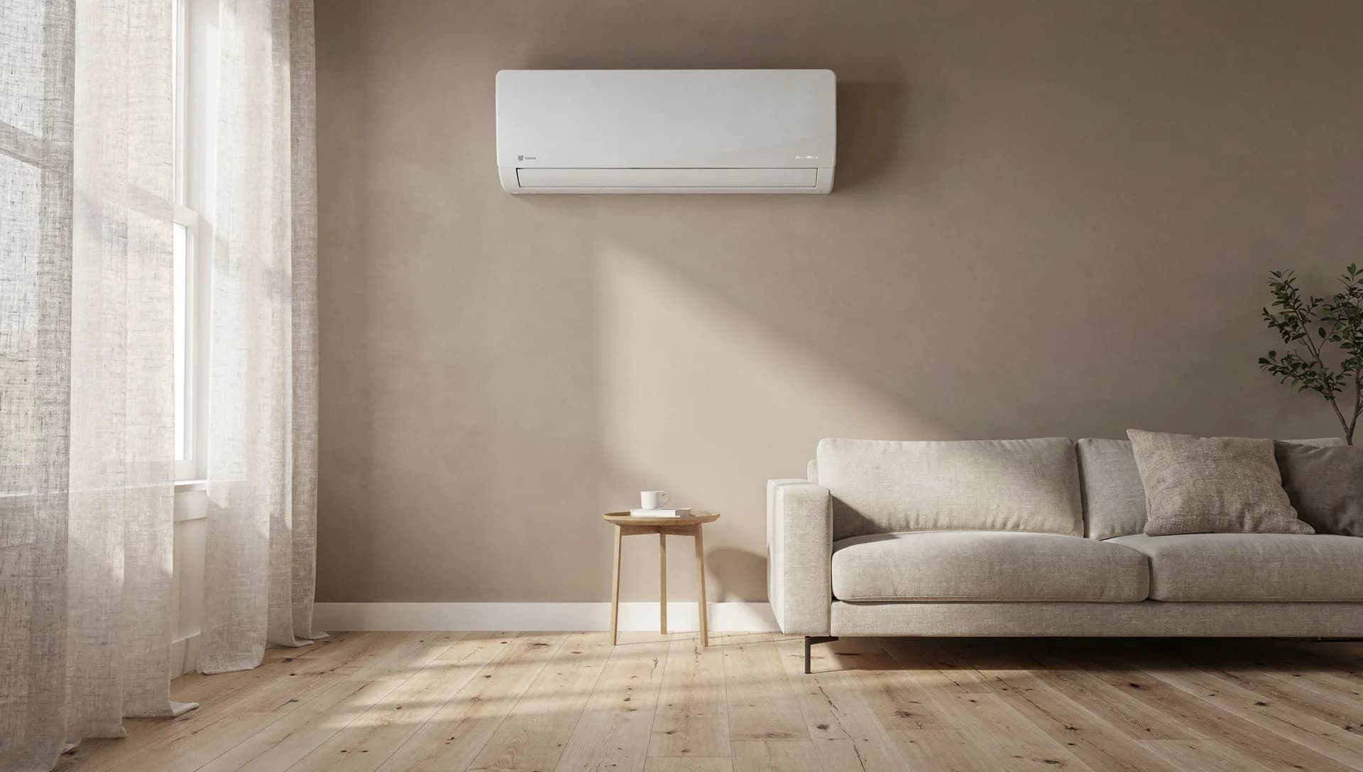 Wall-mounted mini split head cooling a bright living room in summer light