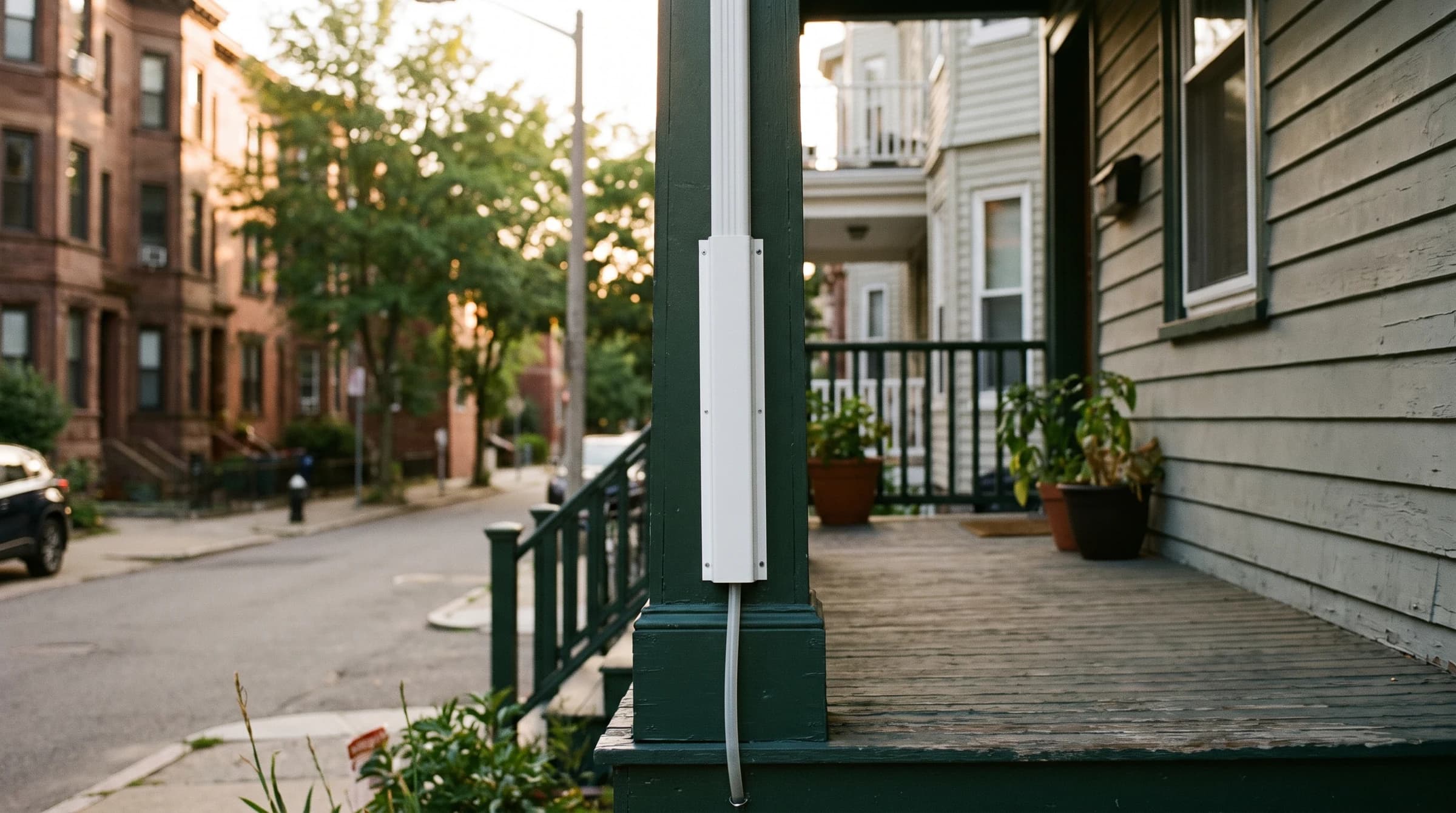 Multi-zone mini split lineset run neatly down the side of a Haverhill triple decker